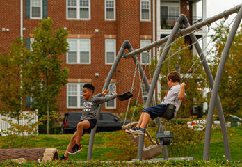 Montgomery County Md Usa An African American And A Caucasian Boy Are Playing Together